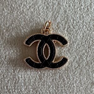 CHANEL Black and Gold Pendant